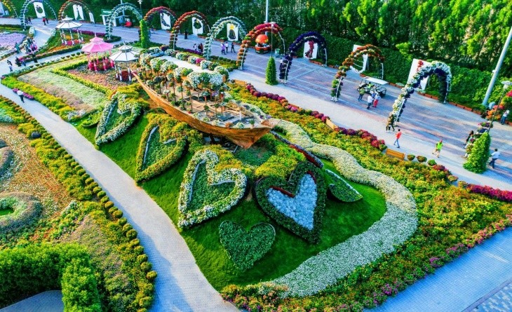 A colorful array of flowers and plants in a family-friendly setting at Dubai Miracle Garden, ideal for children's activities