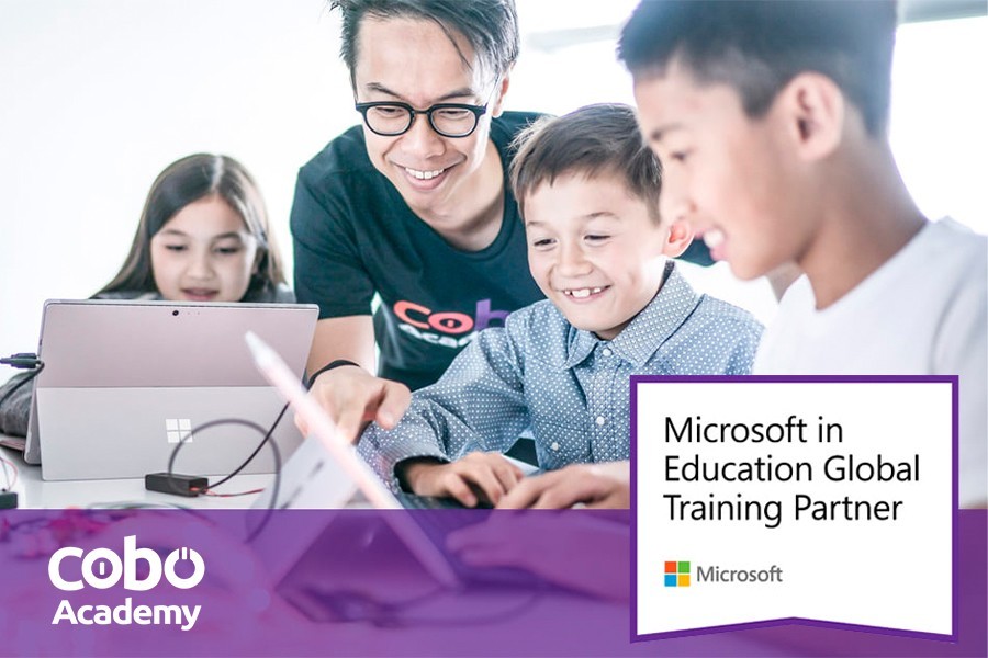 Microsoft logo with students engaged in coding classes in Dubai, highlighting global training partnerships in education