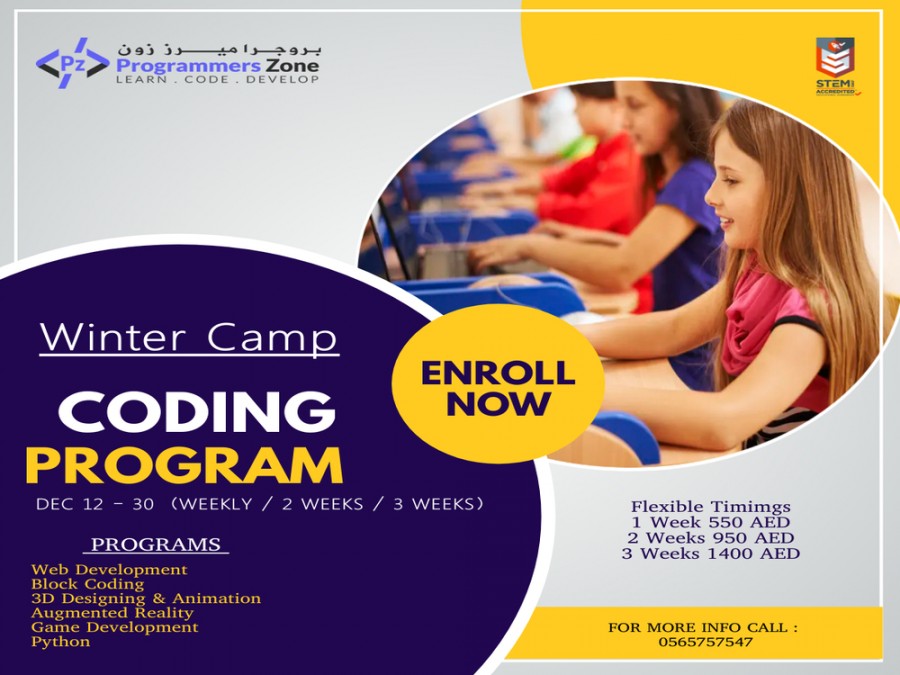 A group of children engaged in coding activities at a winter camp in Abu Dhabi