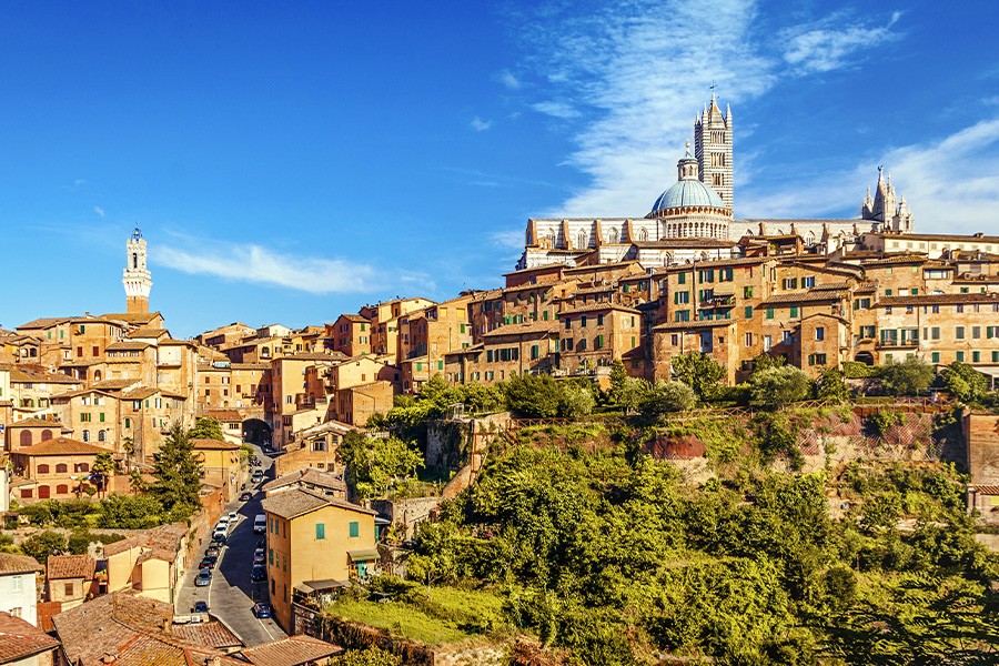Scenic view of Siena, Italy, showcasing its historic architecture and vibrant atmosphere during a holiday visit